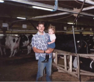 Chris and daughter in barn